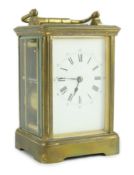 An early 20th century French brass carriage clock by Drocourt & Co. of Paris, with enamelled Roman