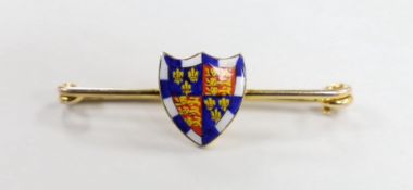 An early 20th century 9ct and polychrome enamel shield bar brooch, depicting the Royal Arms of