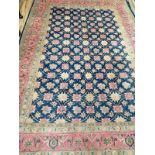 A North West Persian blue ground carpet, 300 x 194cm