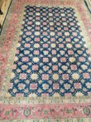 A North West Persian blue ground carpet, 300 x 194cm