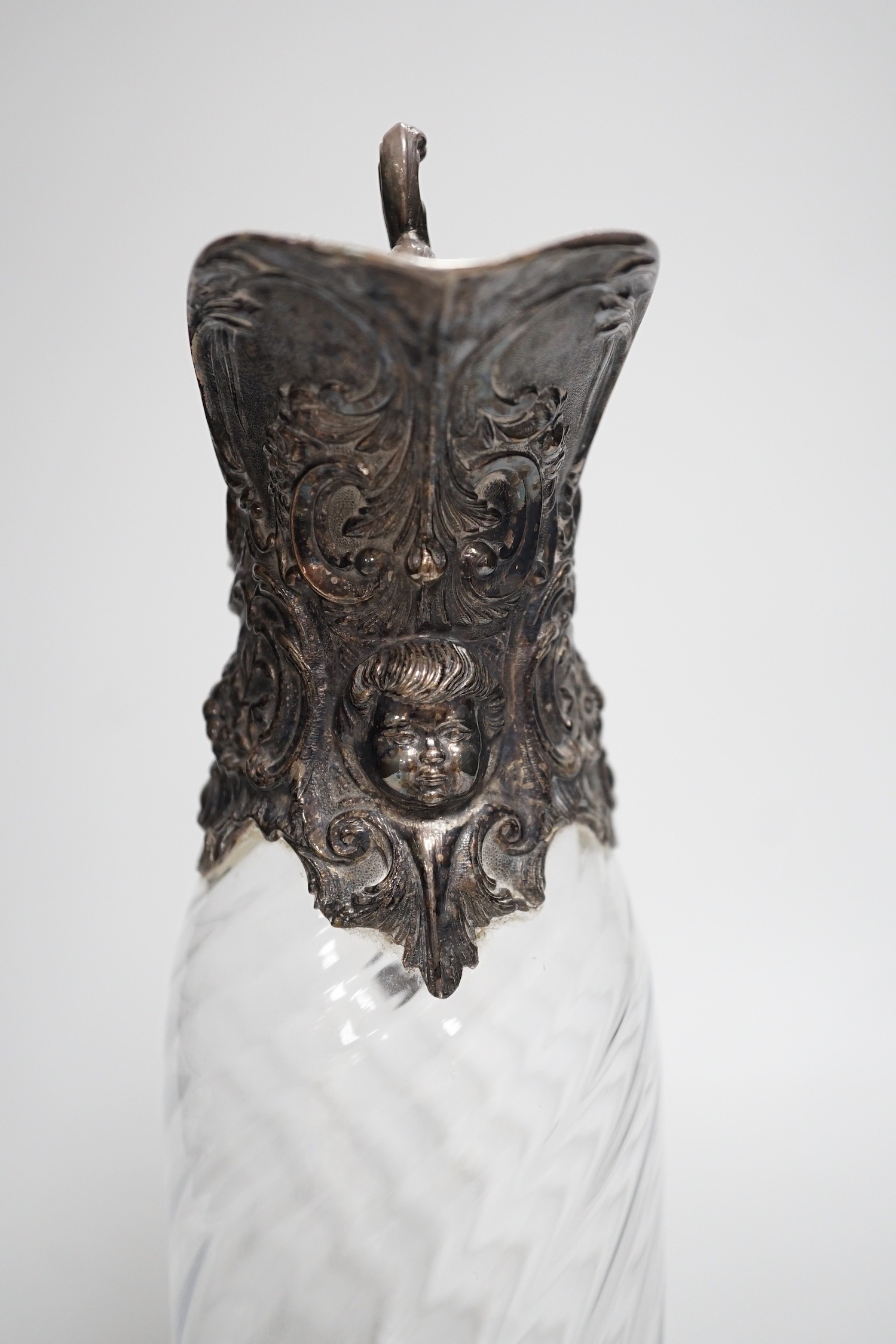 A Victorian rococo style electroplate mounted glass claret jug. 33cm tall - Image 2 of 5