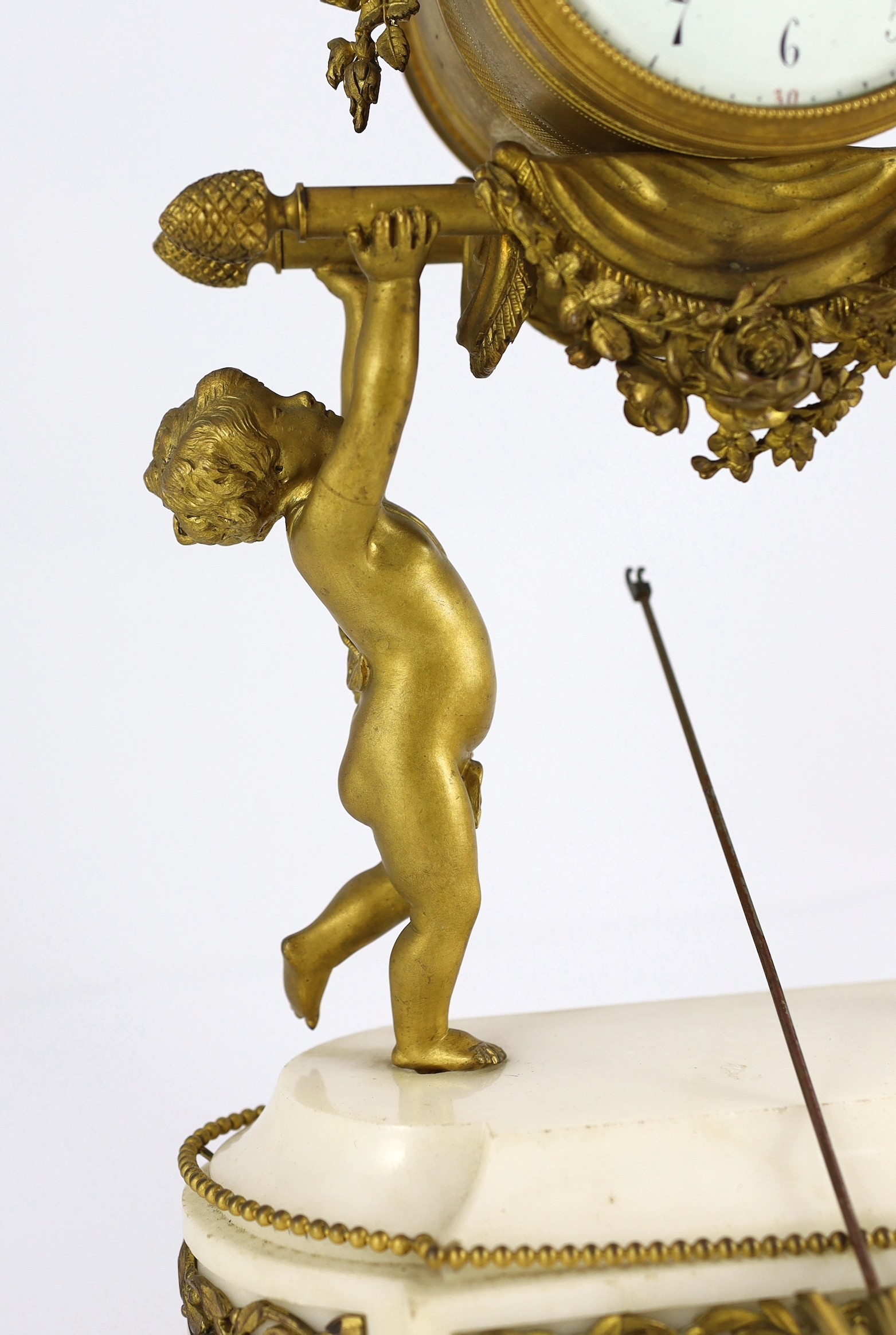 A French Louis XVI style ormolu and white marble mantel clock, the drum case supported by figures of - Image 2 of 7