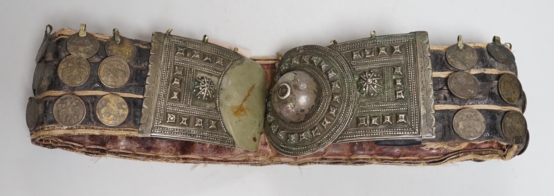 A 19th century Afghan belt, Russian coin mounted