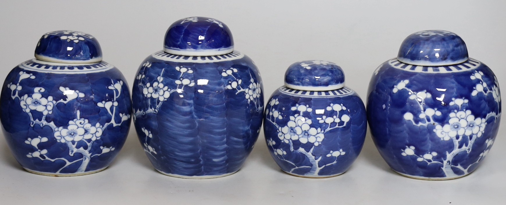 Four Chinese blue and white prunus pattern ginger jars, together with three similar vases. 19th/ - Image 8 of 10