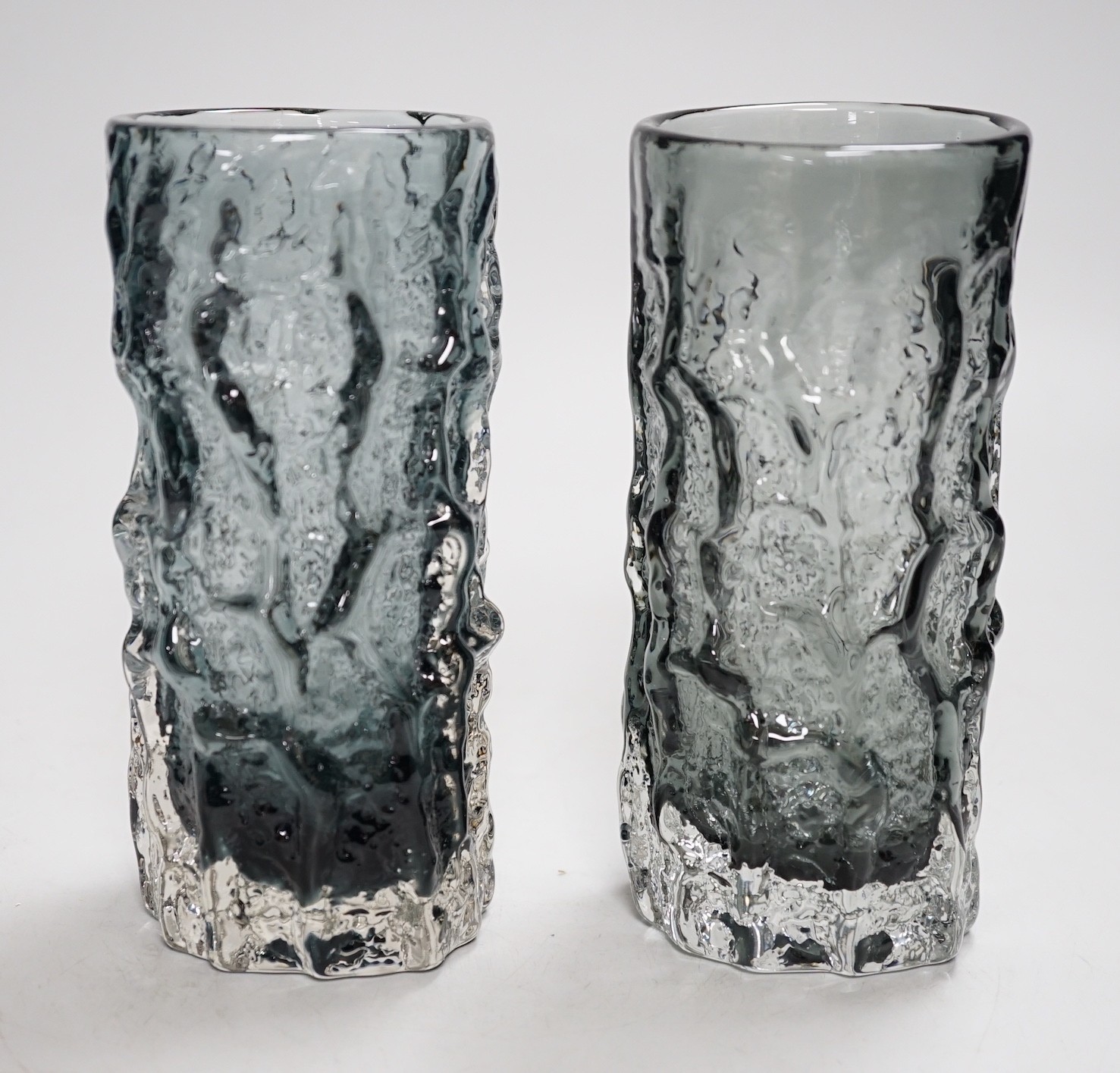A pair of Whitefriars pewter glass bark vases. 15cm tall