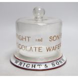 A Wright & Son’s Wafers display pottery stand with glass dome. 19cm tall overall