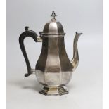 A George V silver octagonal bachelor's coffee pot, Finnegans Ltd, London, 1911, height 18cm, gross