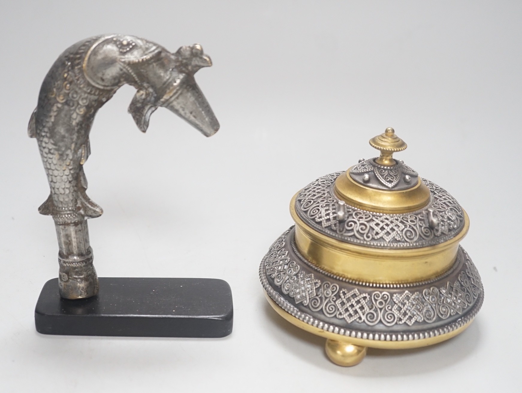 A Continental silvered and gilt metal inkwell, c.1900, and an Indo-Persian silvered bronze ‘fish’