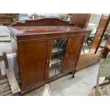 A 1920s mahogany side cabinet, width 137cm, depth 38cm, height 142cm