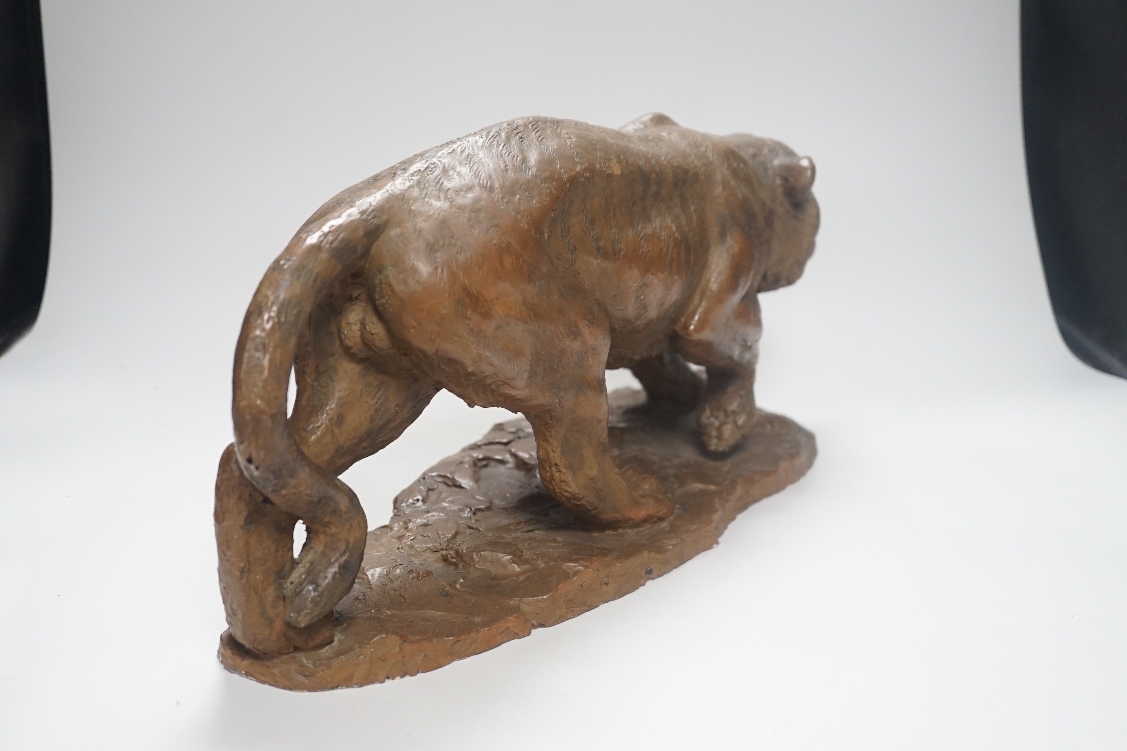 A cold cast resin bronze model of a prowling tiger, 45cm long - Image 4 of 4