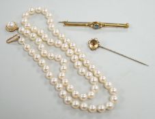 A single strand cultured pearl necklace, with 9ct gold clasp, 46cm, together with a yellow metal and