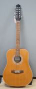 A 12 string acoustic guitar, unknown maker, repaired by John Degay of Degay Guitars