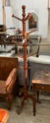 A 19th century Continental turned beech tripod coat and hat stand, height 189cm
