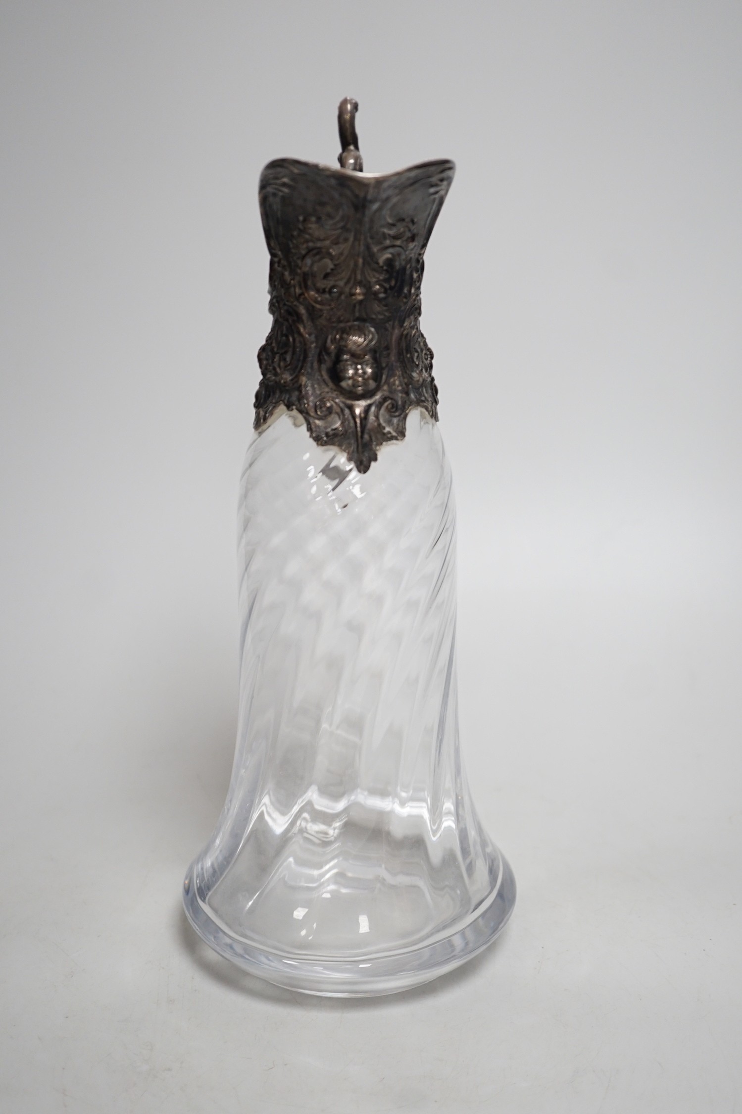 A Victorian rococo style electroplate mounted glass claret jug. 33cm tall - Image 3 of 5