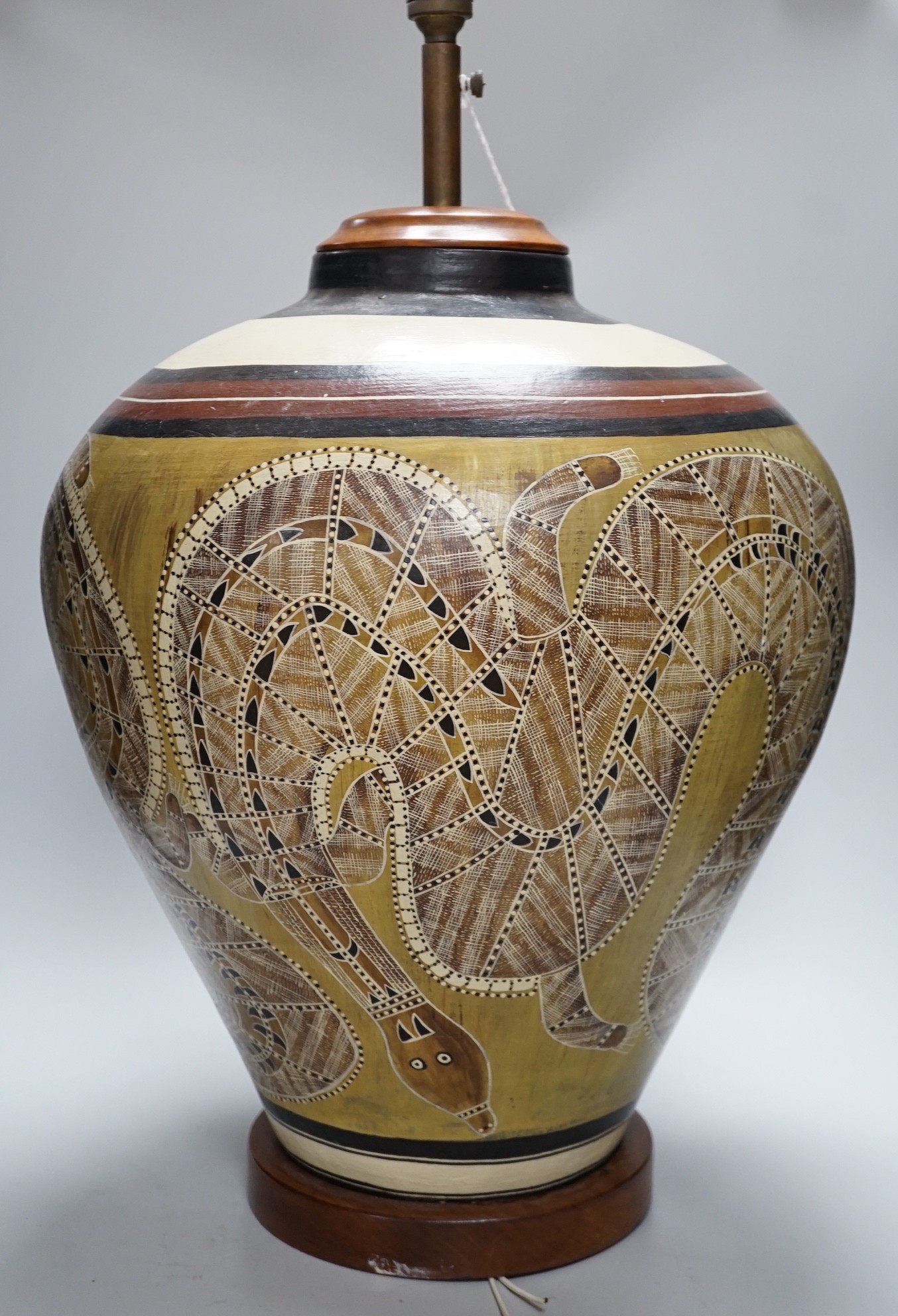 An Australian Aboriginal style painted pottery large lamp, 61cm total height