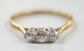 An 18ct & plat, three stone diamond ring, size P/Q, gross weight 2.2 grams.