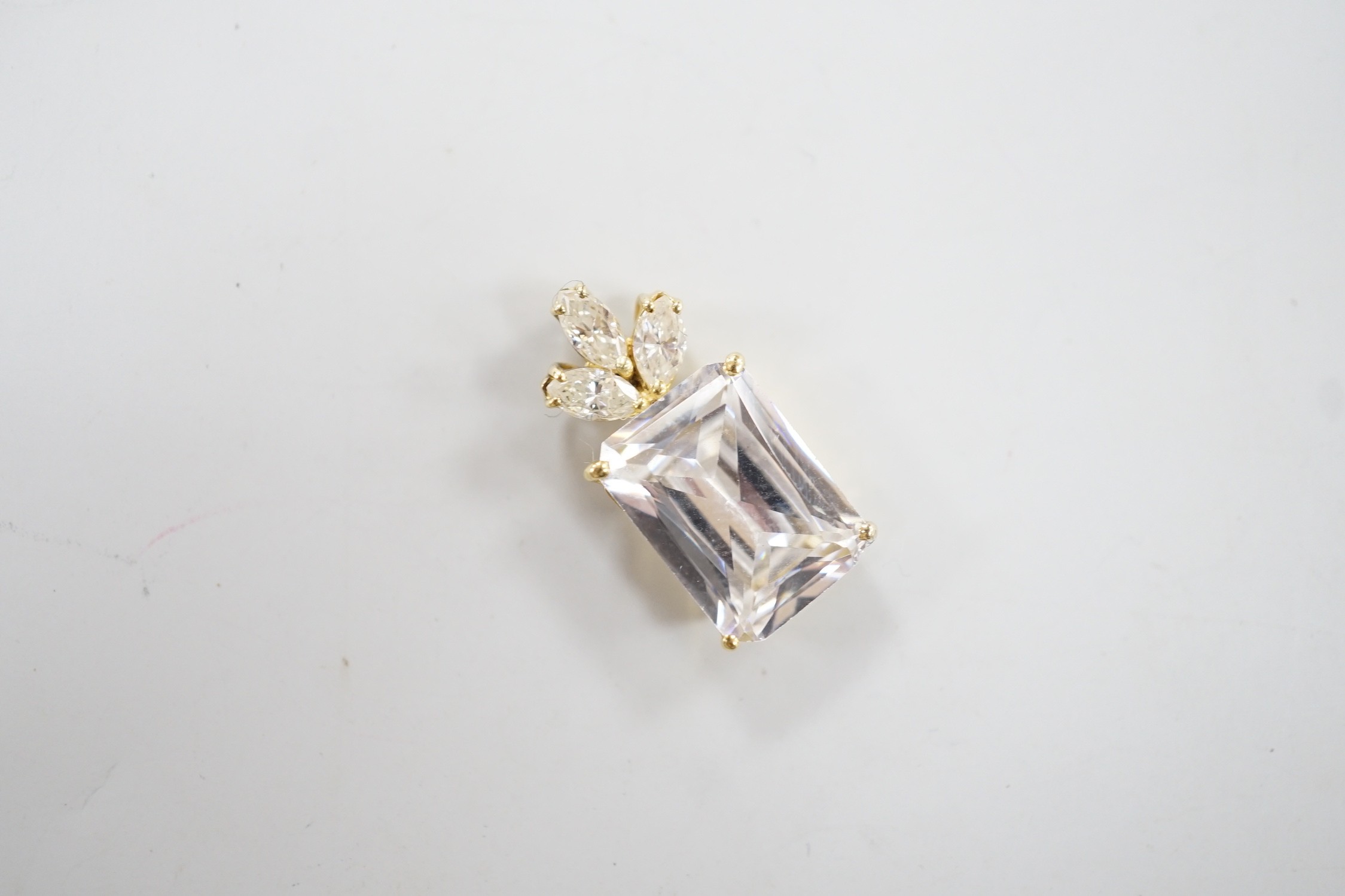 A modern yellow metal mount single stone simulated diamond and three stone diamond set pendant, - Image 3 of 4