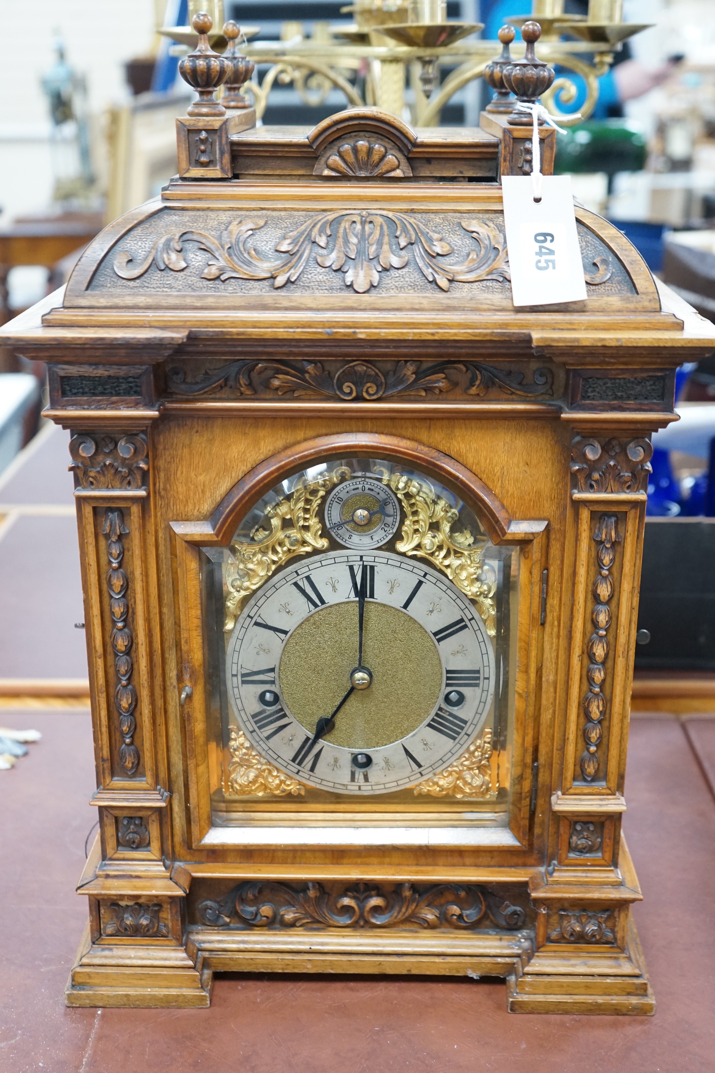 A 19th century architectural walnut bracket clock, with key and pendulum. 53cm tall - Image 3 of 5