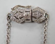 An early to mid 20th century white metal, baguette and round cut diamond set clasp chain, approx.