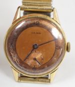 A gentleman's gold plated Olma manual wind wrist watch, case diameter 32mm, on associated flexible