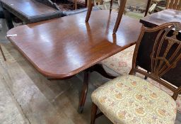 A Regency rectangular mahogany tilt-top dining table, length 136cm, width 90cm, height 71cm