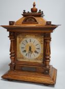 A German oak cased clock, plaque reads ‘Presented to Harry Collins on the occasion of his marriage