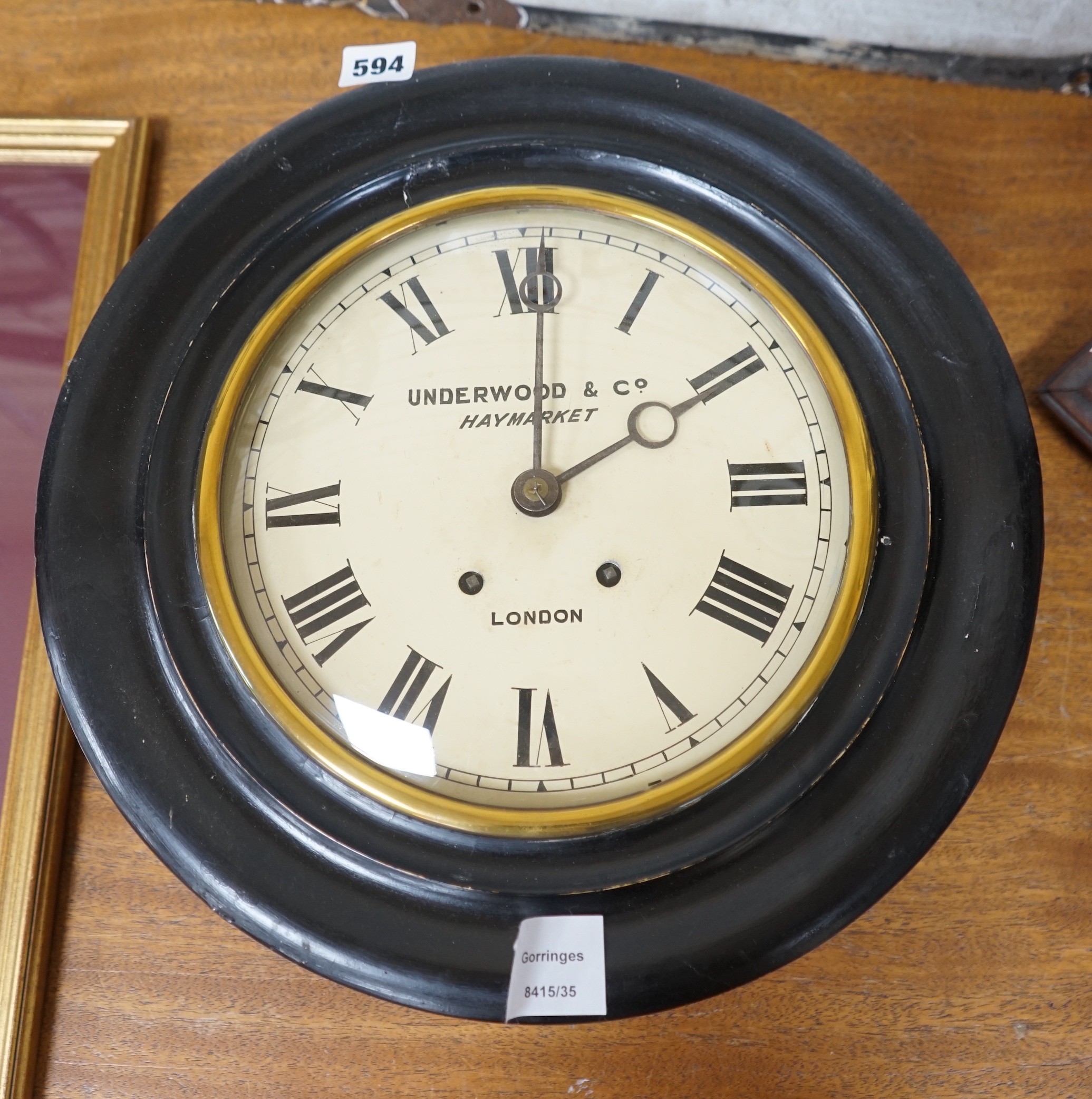 An Underwood & Company, Haymarket wall clock, 37cm diameter