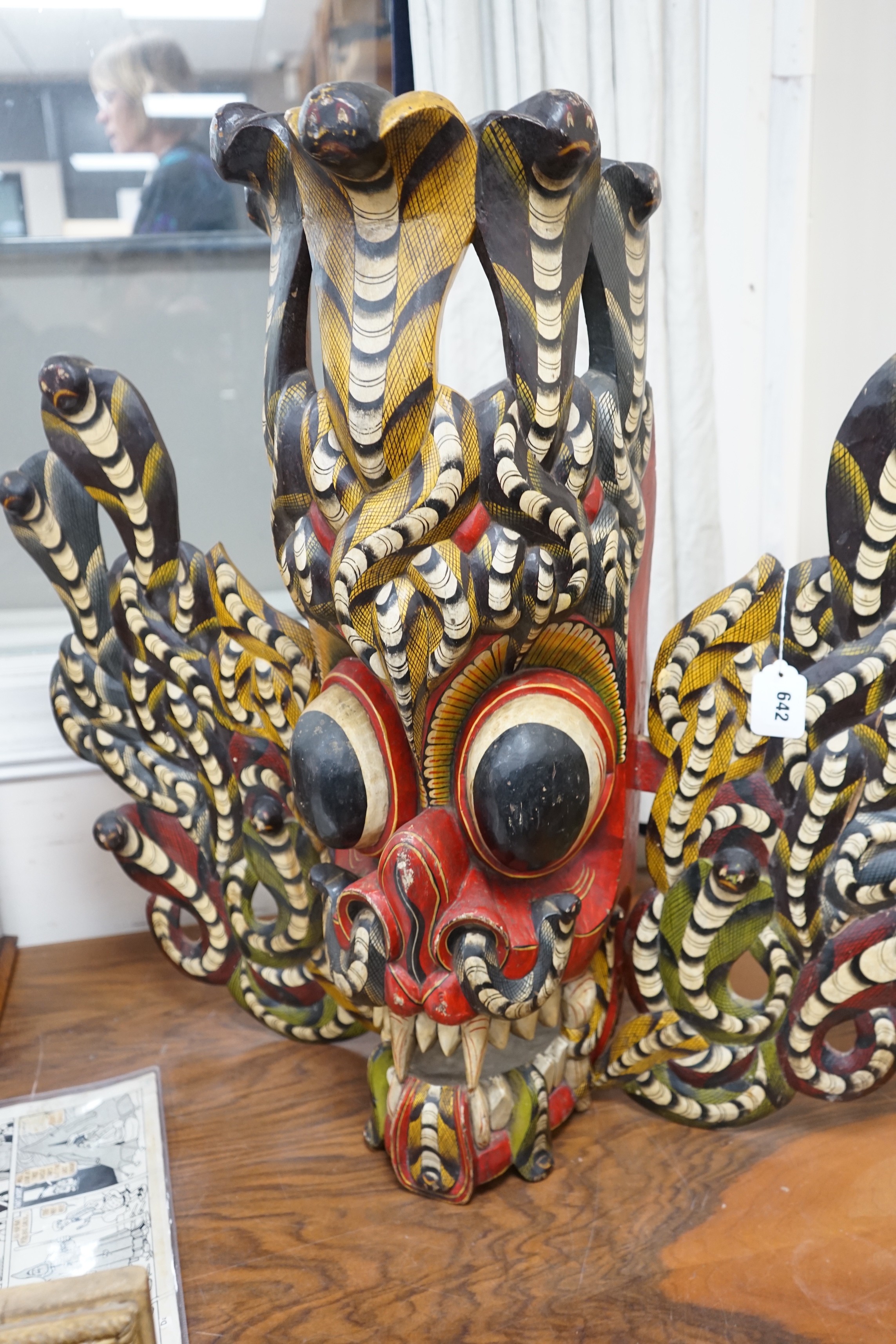 A large interesting Sri-Lankan painted wood Naga Raksha mask, early 20th century, 77cm tall - Image 3 of 3