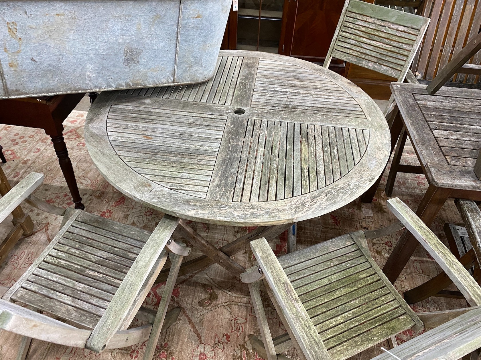 A John Lewis retailed weathered teak circular folding garden table, diameter 120cm, height 74cm - Image 2 of 3