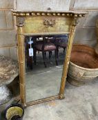 A Regency giltwood and composition pier glass, width 64cm, height 108cm