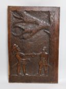 A 17th century style carved oak panel, 'Colonist attacking a Native American Indian' 56x36cm