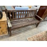 A painted weathered teak garden bench, length 158cm, depth 56cm, height 89cm