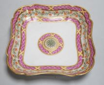 An 18th century Rue Thiroux square shaped dish painted with two bands of pink leaves, and a band