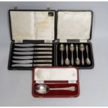 Three cased sets of silver flatware including a 1953 Commemorative dog nose spoon, six teaspoons and