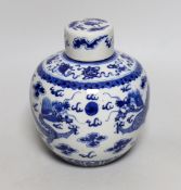 A Chinese blue and white ‘dragon’ jar and cover, 19th century, 18cm tall