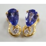 A modern pair of 18k, tanzanite and diamond set ear clips, 13mm, gross weight 4.4 grams.