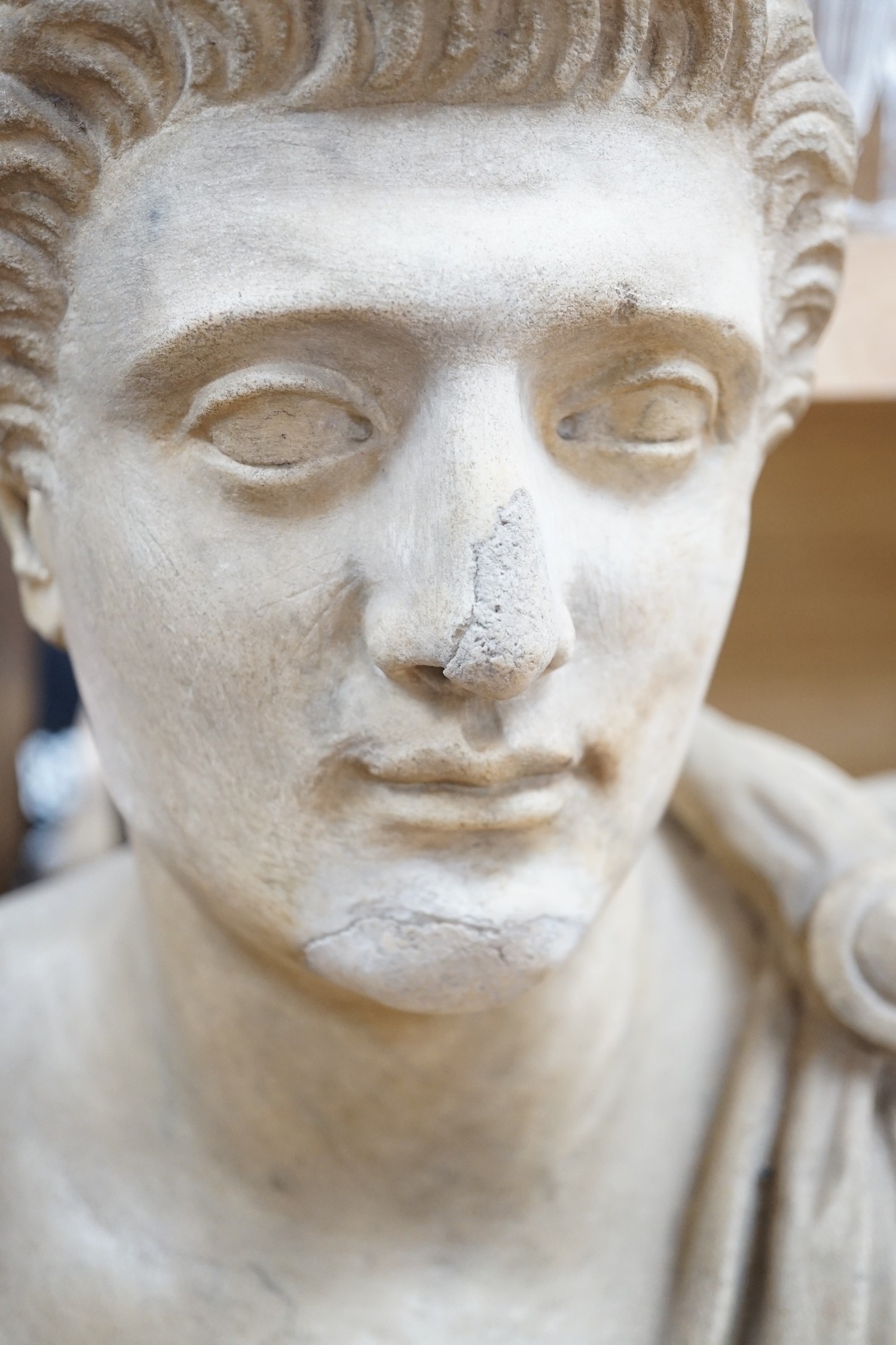 After the Antique marble bust of a Roman man wearing a Chlamys with a buckle at the shoulder, - Image 2 of 4