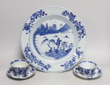 A Chinese blue and white landscape dish, Qianlong period 31cm diameter, together with a similar pair