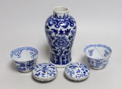 A Chinese blue and white phoenix decorated vase, a pair of circular boxes and a pair of damaged