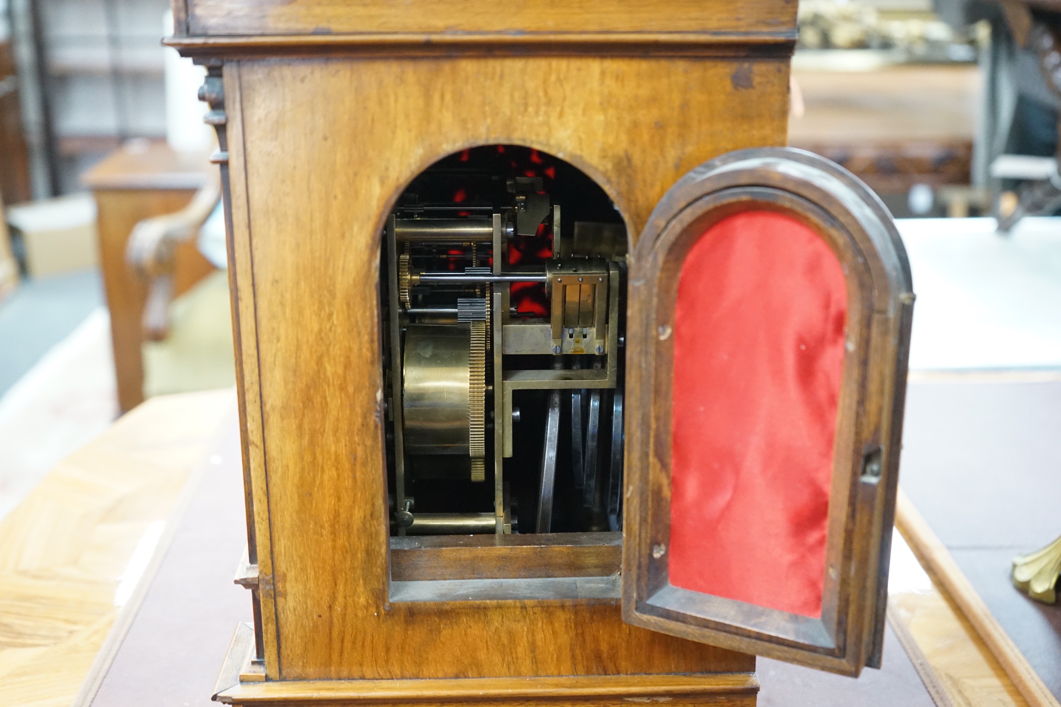 A 19th century architectural walnut bracket clock, with key and pendulum. 53cm tall - Image 5 of 5