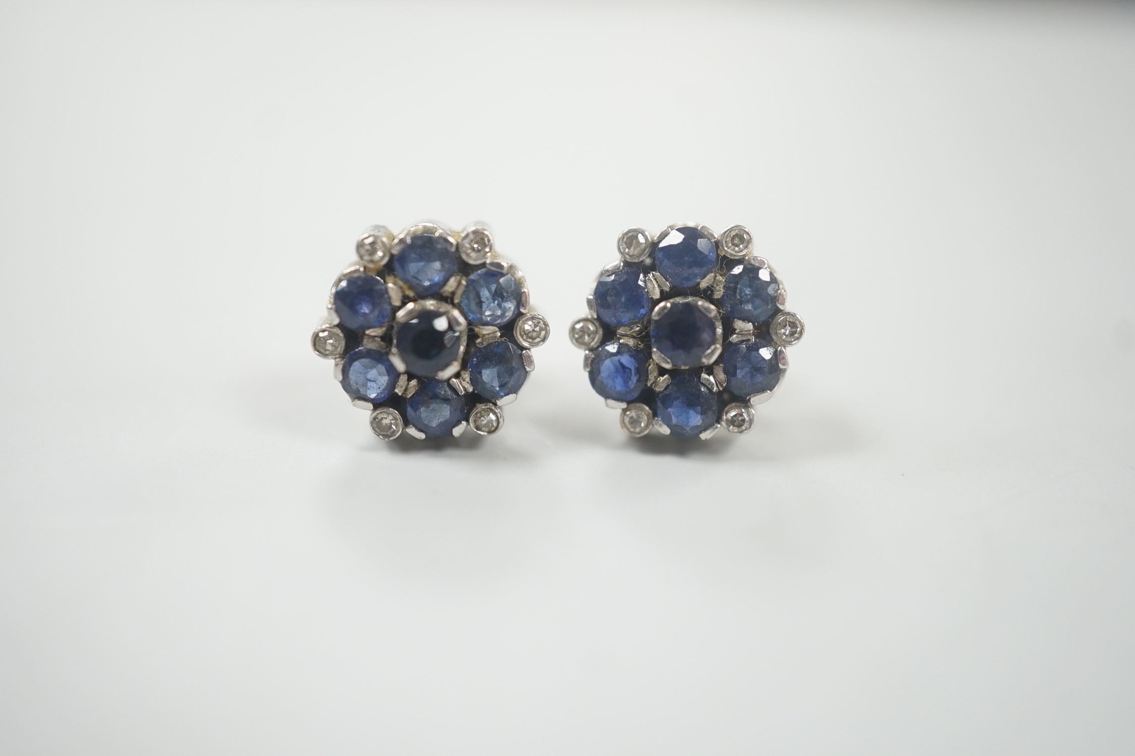 A pair of white metal, sapphire and diamond cluster set flower head ear studs, 10mm, gross weight - Image 5 of 6