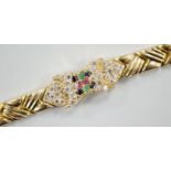 A modern 585 yellow metal, ruby, sapphire, emerald and diamond cluster set bracelet, 17.5cm, gross