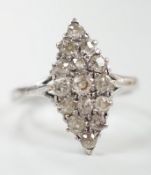 A mid 20th century 18ct white metal and diamond set marquise cluster ring, size P, gross weight 2.