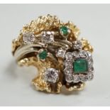 A modern 14k, emerald and diamond cluster set modernist dress ring, size L, gross weight 13.4