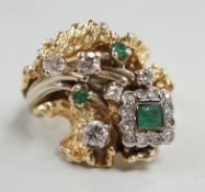 A modern 14k, emerald and diamond cluster set modernist dress ring, size L, gross weight 13.4