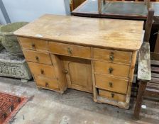 A Victorian pine kneehole dressing table, width 112cm, depth 55c, height 74cm