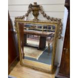 A 19th century French rectangular giltwood wall mirror with urn surmount, width 96cm, height 140cm