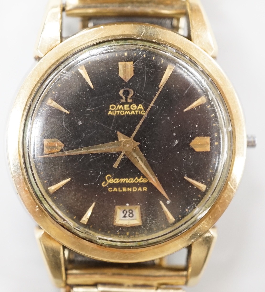 A gentleman's steel and gold plated Omega Seamaster Calendar automatic black dial wrist watch,