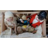 An Armand Marseille bisque head baby doll, a black plastic doll and other dolls and toys