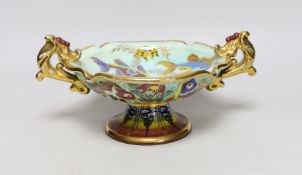 A French tazza with two handles, vibrant colours 30cm wide